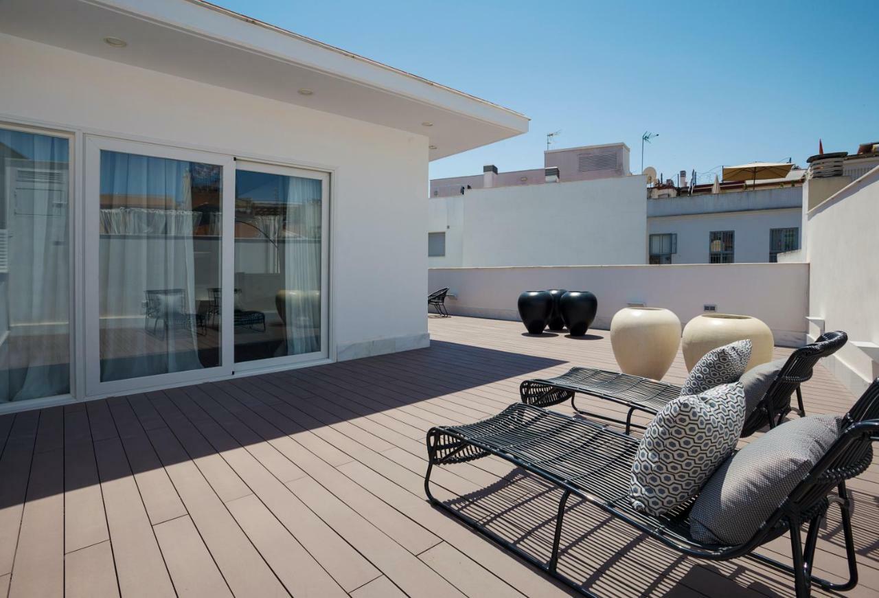 Apartamentos One Shot Conde De Torrejon Sevilla Bagian luar foto