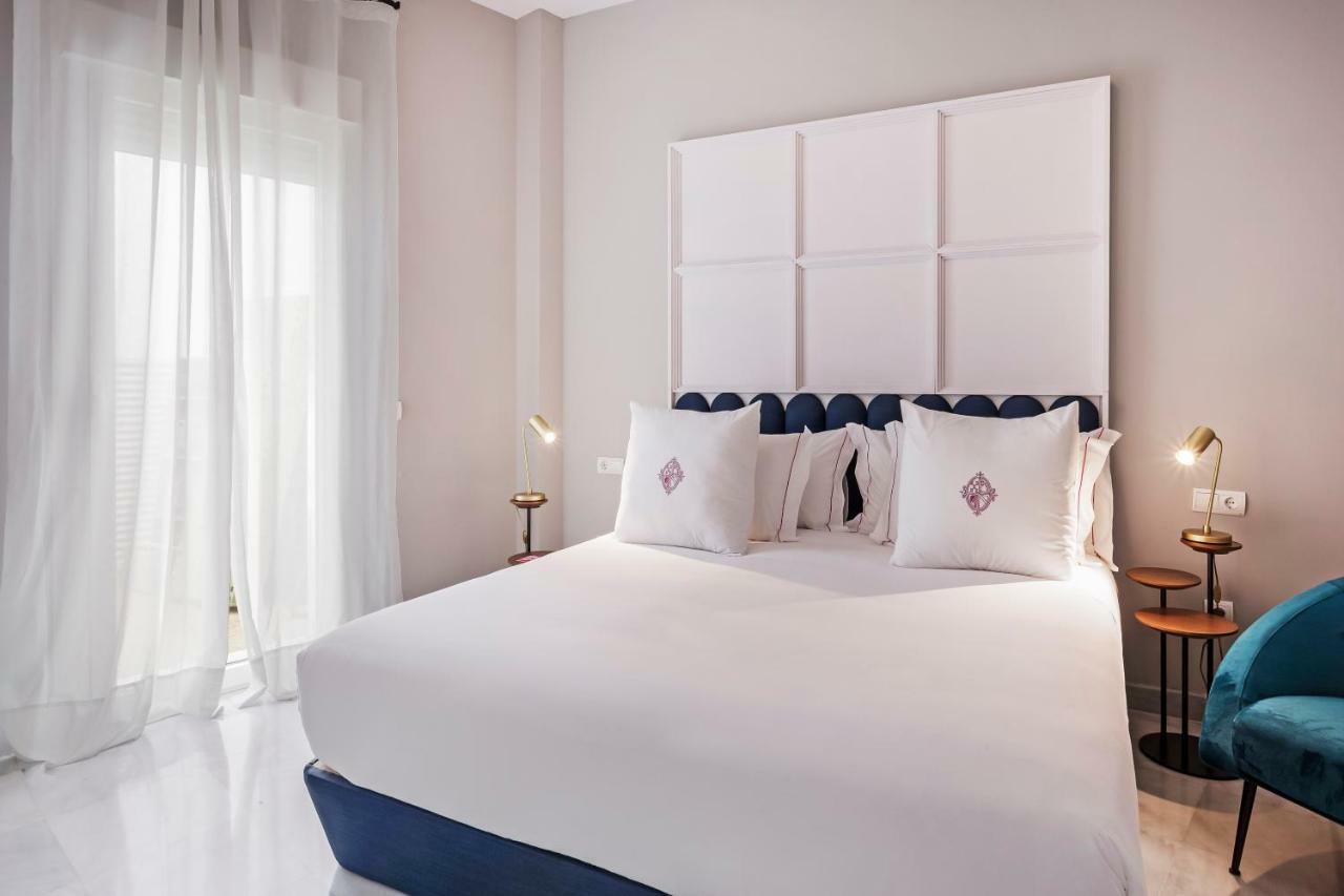 Apartamentos One Shot Conde De Torrejon Sevilla Bagian luar foto